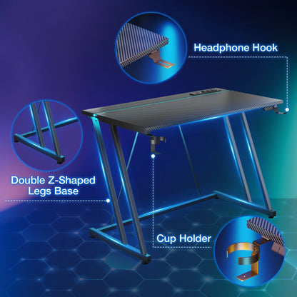 31.5 inch Gaming Desk with Z-Leg Design, Computer Desk with LED Light & Power Outlet, Gaming Table Suitable for Small Space, Black