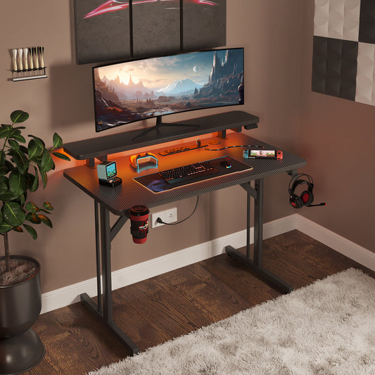 Gaming Desk 31 INCH, T- Shaped Carbon Fiber Surface Computer Desk with Full Desk Mouse Pad, Gamer Desk with Double Headphone Hook, USB Gaming Rack, Cup Holder, Black