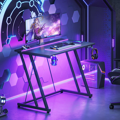 31.5 inch Gaming Desk with Z-Leg Design, Computer Desk with LED Light & Power Outlet, Gaming Table Suitable for Small Space, Black