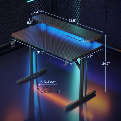 Gaming Desk 31 INCH, T- Shaped Carbon Fiber Surface Computer Desk with Full Desk Mouse Pad, Gamer Desk with Double Headphone Hook, USB Gaming Rack, Cup Holder, Black